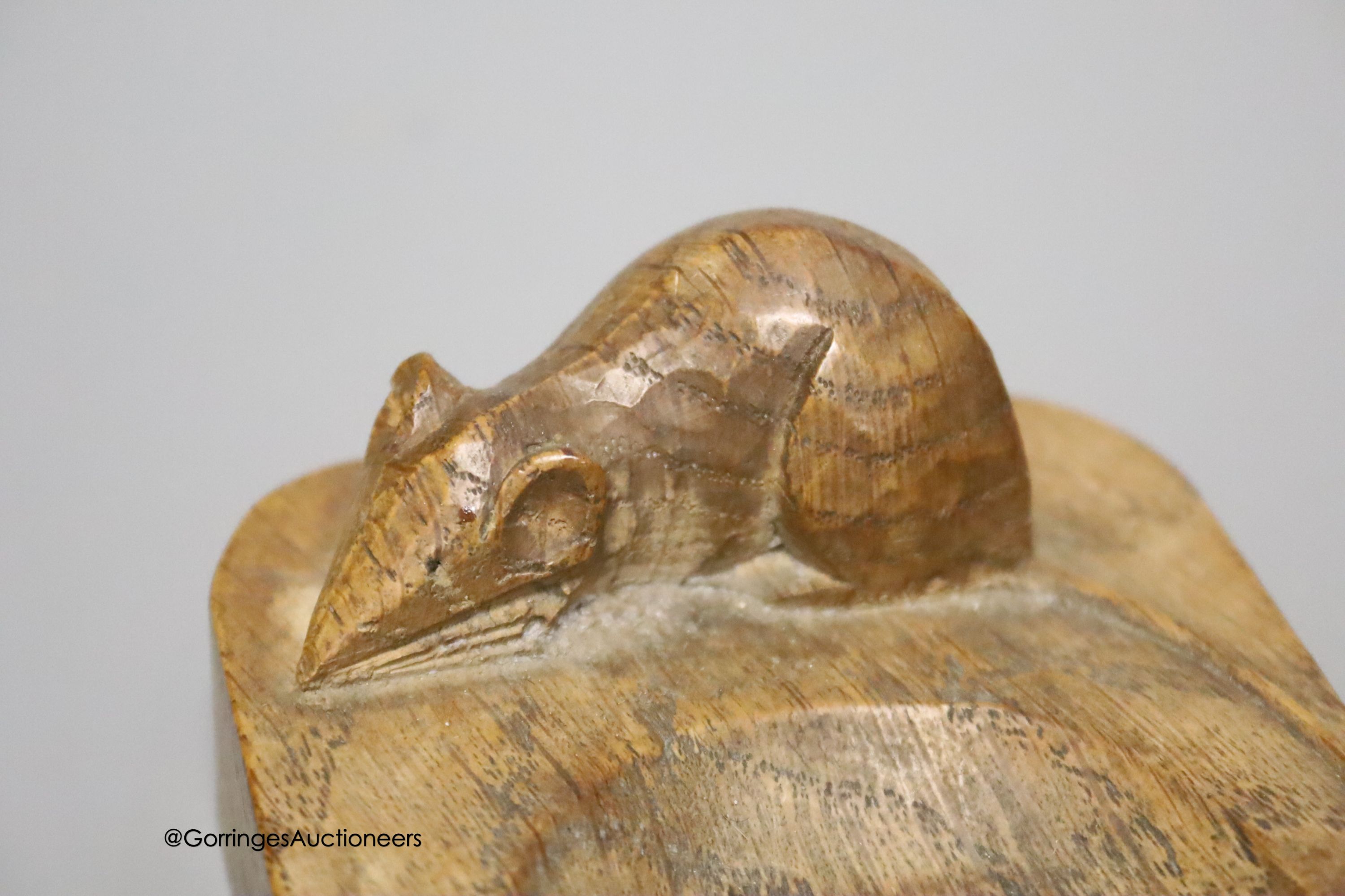 Two Mouseman carved oak ashtrays, largest 10cm